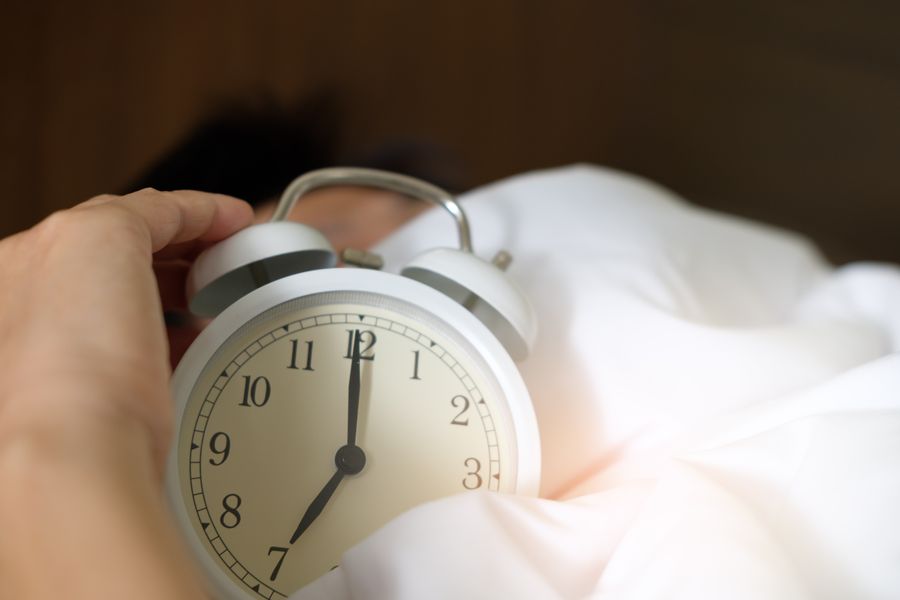 Person sleeping peacefully — quality sleep is essential for weight loss and metabolic health