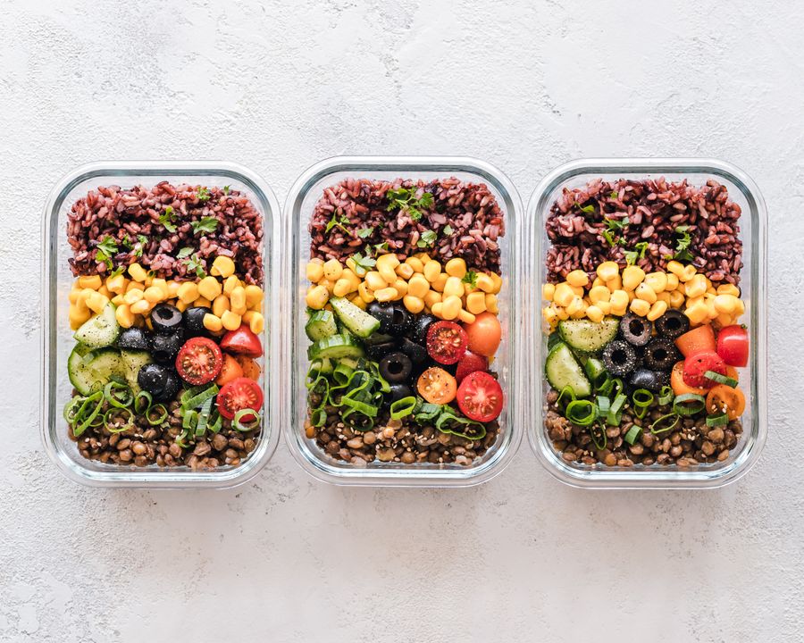 Healthy meal prep containers with nutritious whole foods — a smart alternative to processed and cured deli meats