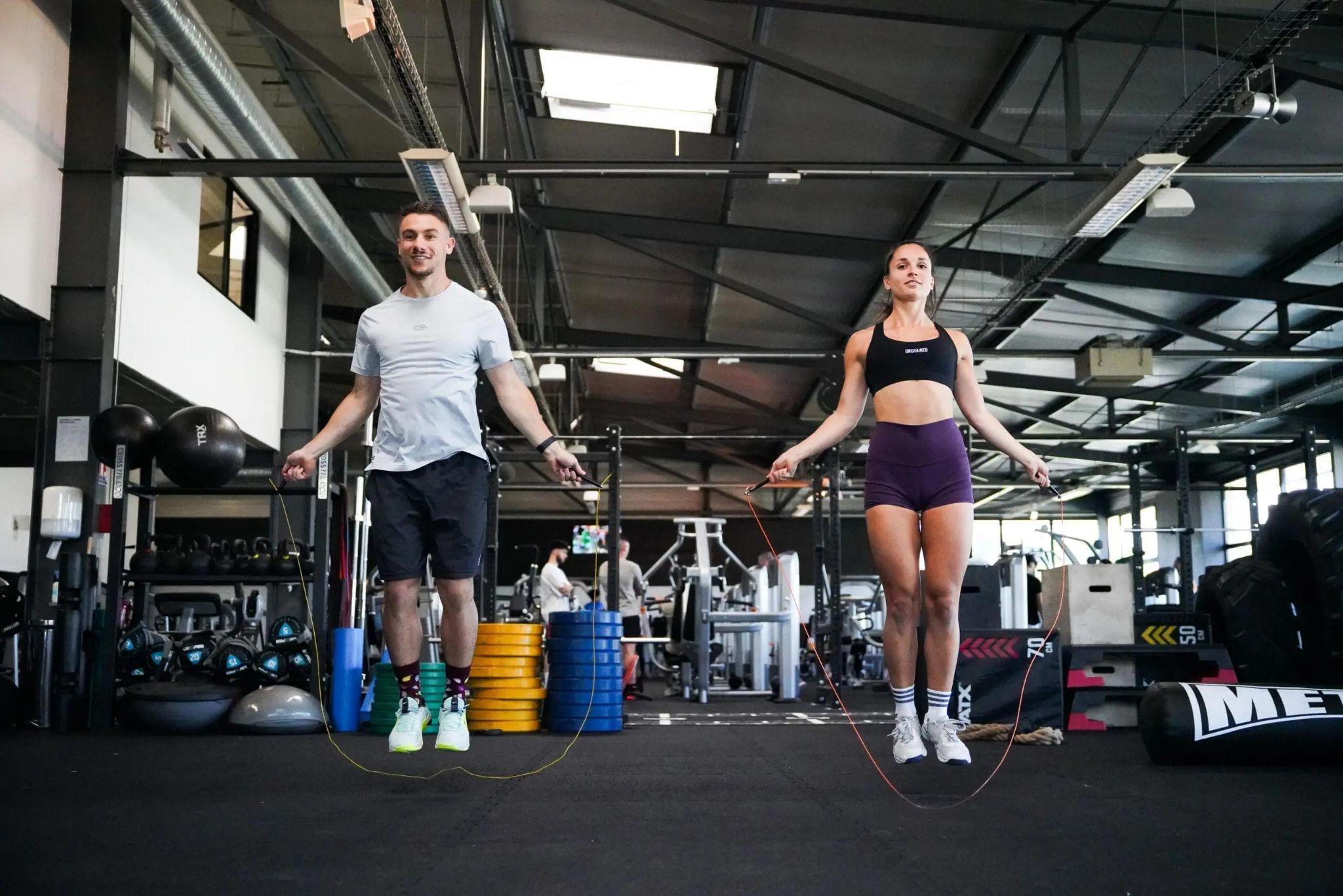 Person doing high-intensity cardio workout to lose belly fat.